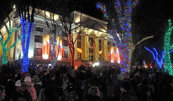 People fill the courthouse plaza for the 2015 Courthouse Lighting in downtown Prescott. The Prescott Chamber of Commerce estimated there were close to 8,000 people in attendance. 