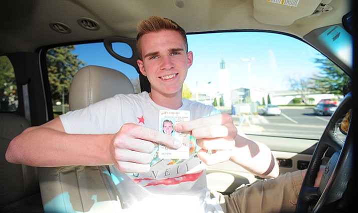 Prescott High School student Cutter Todd shows off his provisional license. He took the Drivers Education class at school and got his license in September.