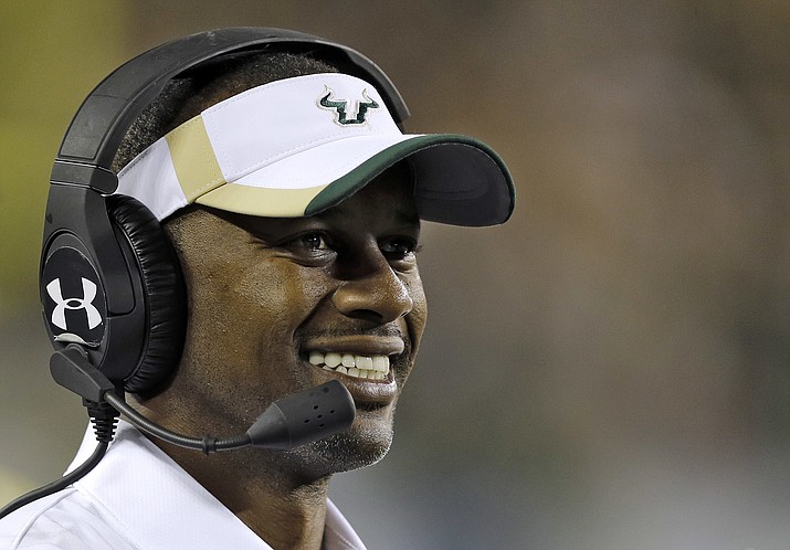 In this Nov. 20, 2015, file photo, South Florida head coach Willie Taggart looks on during the second half of an NCAA college football game against Cincinnati, in Tampa, Fla. South Florida football coach Willie Taggart has informed the school that he is leaving to become the coach at Oregon, a person with direct knowledge of the situation tells The Associated Press. 