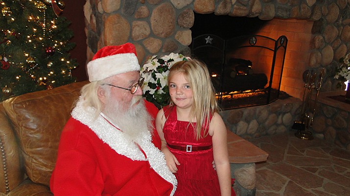 Kalia Thurman got to sit with Santa. 
