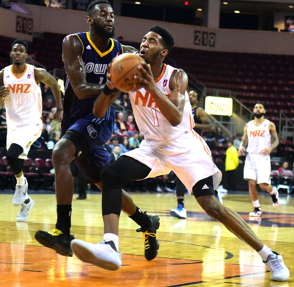 Northern Arizona's Derrick Jones Jr. gets fouled as the Suns take on the Iowa Energy Saturday, December 10 at the Prescott Valley Event Center.  (Les Stukenberg/The Daily Courier)