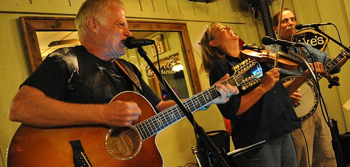 Thunder & Lightnin’ is made up of (from left) Steve Estes, Belita Mullinax, and Rob Gibbs. (Photo by Vyto Starinskas)