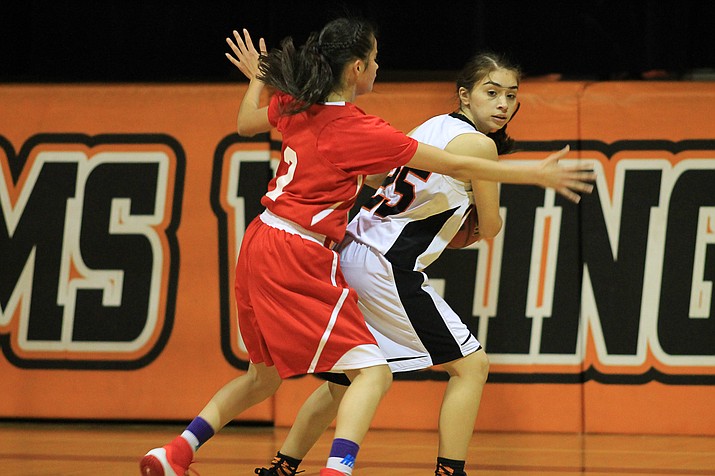 Diana Gonzalez works around a defender during the game with Grand Canyon.