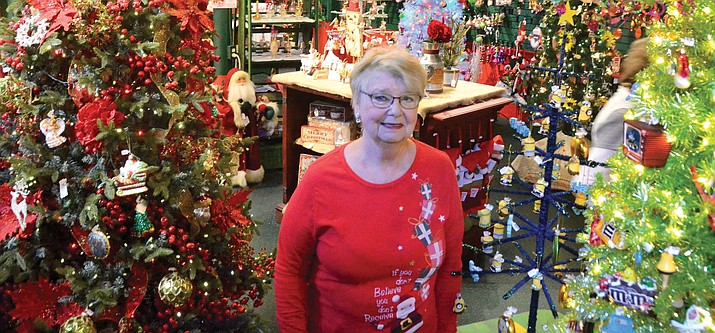 Diana Martin stands inside the Mooey Christmas & Udder Things store in Jerome on Wednesday.