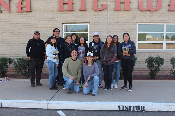 Hopi High media students hang out with Arizona Highways editors. They are, from left,. driver Dixon Silas, Tyesha Lomayaktewa, Ronald "Slippers" Lopez, Larissa "Mayor" Mariano, Serena Leslie, Elyse "Mouth" Casarez, Kyle Secakuku, Janissa Lahaleon, Breana Saufkie and ShiDaisy Nelson. Editor Robert Stieve and Associate Editor Kelly Vaughn are in the front. Stan Bindell/NHO