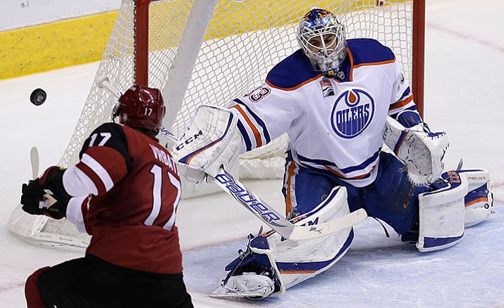 Edmonton Oilers goalie Cam Talbot makes the save on Arizona Coyotes right wing Radim Vrbata (17) in the second period during an NHL hockey game, Wednesday, Dec. 21, in Glendale.
