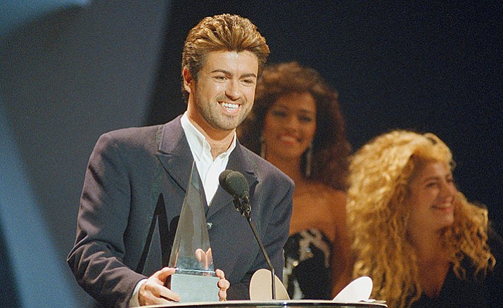 George Michael accepts an award on Jan. 31, 1989, in Los Angeles. Michael died Sunday, Dec. 25, 2016. He was 53.