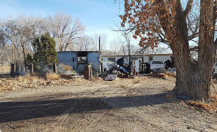 The Shiprock Police Department and several fire crews were on hand to put out a house fire that left one person deceased Dec. 13. Submitted photo