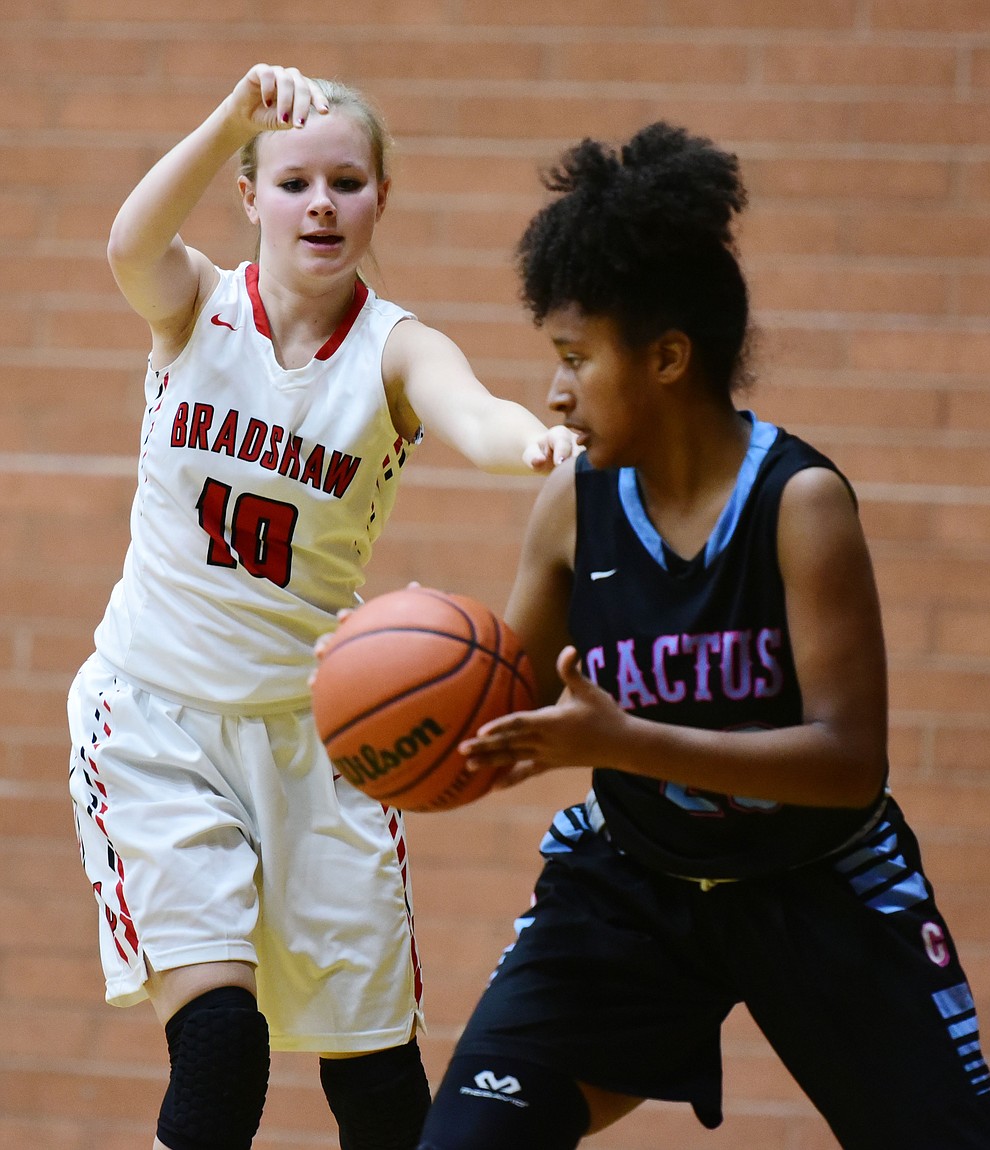 Bradshaw Mountain's Berlin Cormey defends as the Lady Bears take on the Cactus Lady Cobras in the semifinal of the Winter Classic at Prescott High School Friday, December 30. (Les Stukenberg/The Daily Courier)
