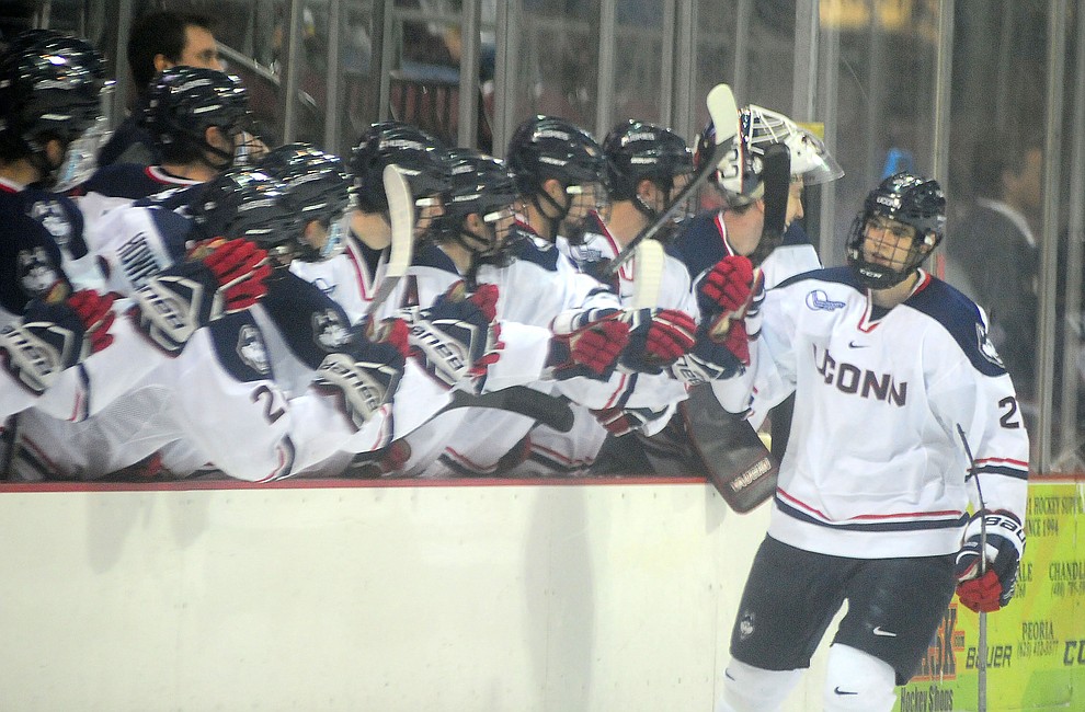 UConn's Maxim Letunov gets congratulated on a goal as the UConn Huskies take on the St Cloud State Huskies in the Desert Hockey Classic at the Prescott Valley Event Center Friday, December 30. (Les Stukenberg/The Daily Courier)