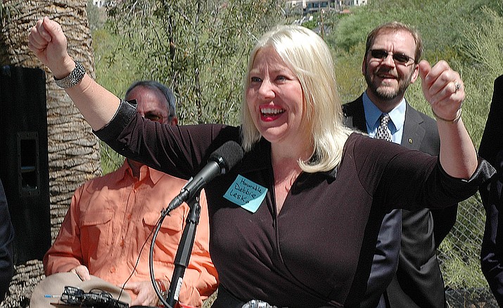 Sen. Debbie Lesko at the ceremonial signing of legislation earlier this year blocking local government from banning or imposing most restrictions on homeowners who want to rent out rooms or entire homes to vacationers.  (Capitol Media Services file photo by Howard Fischer)