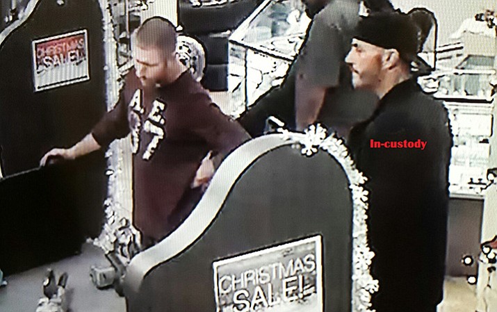 The man on the left is still sought in conjunction with a Dec. 3 burglary in Mayer. The man on the right, identified as 43-year-old Nick Ferrero, was arrested Dec. 27.
