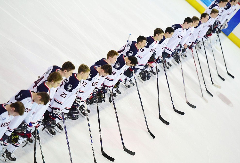 Husky players during the National Anthem as the Bears from Brown University take on the UConn Huskies in the championship match of the Desert Hockey Classic at the Prescott Valley Event Center Saturday, December 31. (Les Stukenberg/The Daily Courier)