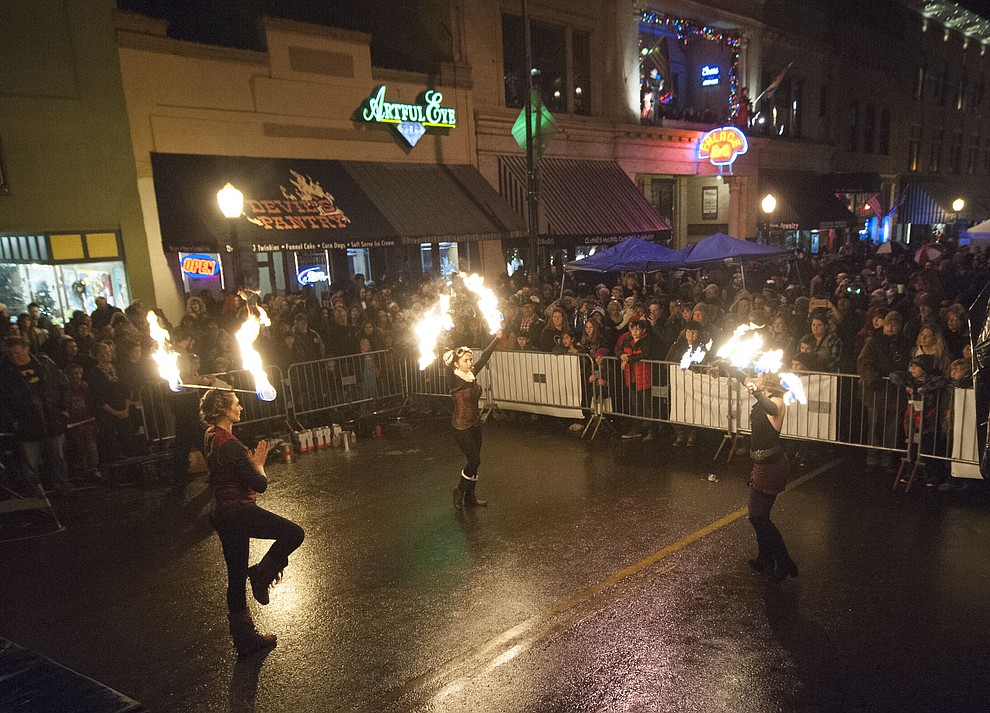 The Nuriya Fire Dancers entertain the large crowd at the 6th Annual Whiskey Row Boot Drop in downtown Prescott Saturday, Dec. 31. (Les Stukenberg/The Daily Courier)