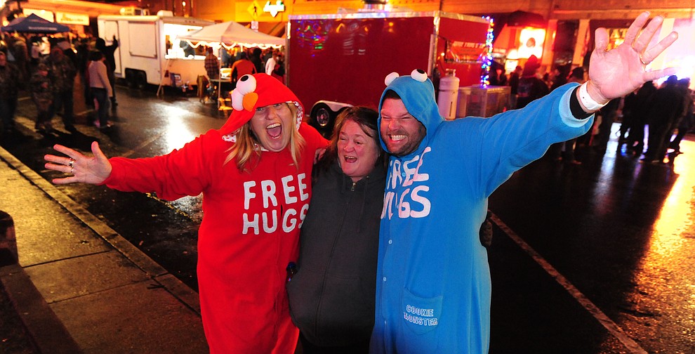 The free hugs gang were out and about at the 6th Annual Whiskey Row Boot Drop in downtown Prescott Saturday, Dec. 31. (Les Stukenberg/The Daily Courier)