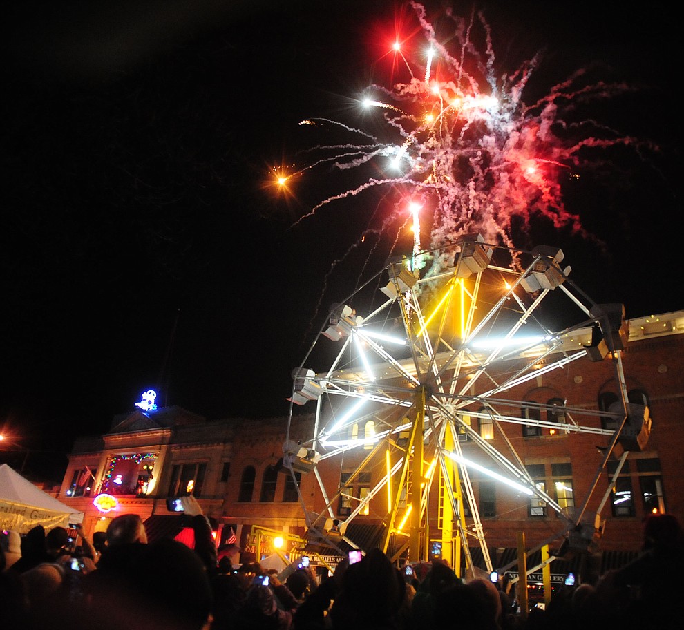 Fireworks erupt from the top of the parking garage at the 6th Annual Whiskey Row Boot Drop in downtown Prescott Saturday, Dec. 31. (Les Stukenberg/The Daily Courier)