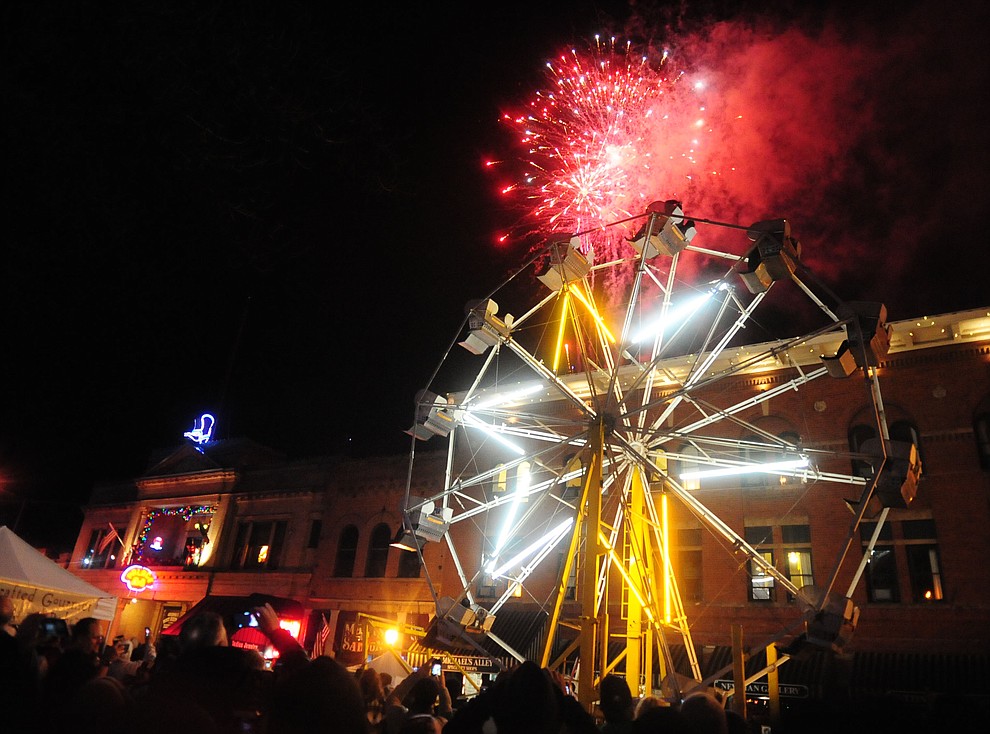 Fireworks erupt from the top of the parking garage at the 6th Annual Whiskey Row Boot Drop in downtown Prescott Saturday, Dec. 31. (Les Stukenberg/The Daily Courier)