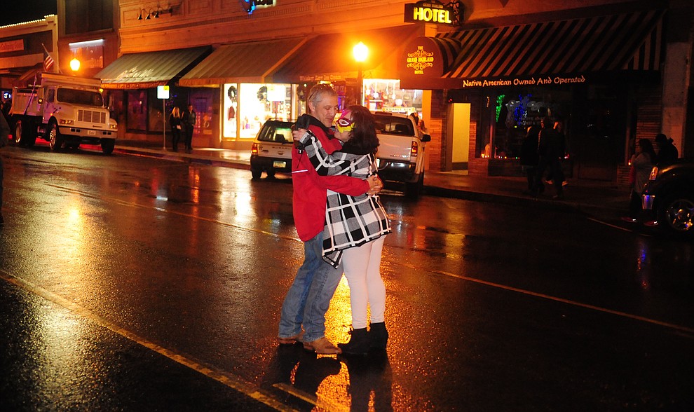 David and Melissa Archuleta share a quiet dance in the street at the 6th Annual Whiskey Row Boot Drop in downtown Prescott Saturday, Dec. 31. (Les Stukenberg/The Daily Courier)