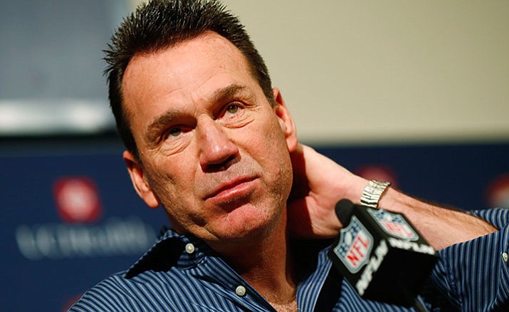 Gary Kubiak reacts at a news conference as he steps down as head coach of the Denver Broncos because of health concerns Monday, Jan. 2, 2017, at team headquarters in Englewood, Colo.