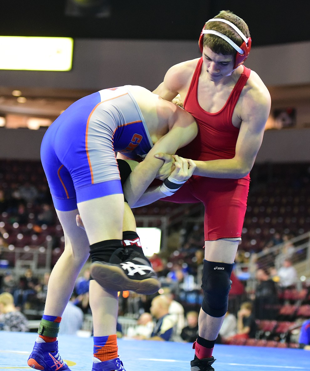 Mingus Union's Trent Miller and Chino Valley's Keller Rock fight for position during the semifinal round of the Mile High Challenge at the Prescott Valley Event Center Tuesday, January 3. (Les Stukenberg/The Daily Courier)