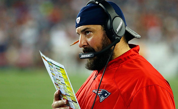 In this Aug. 11, 2016, file photo, New England Patriots defensive coordinator Matt Patricia watches during the first half of a preseason NFL football game against the New Orleans Saints in Foxborough, Mass. With six vacancies around the NFL, head coach candidates are being carted around the country for interviews. The hot prospects, unsurprisingly, are in New England with assistants Josh McDaniels and Matt Patricia topping the list.