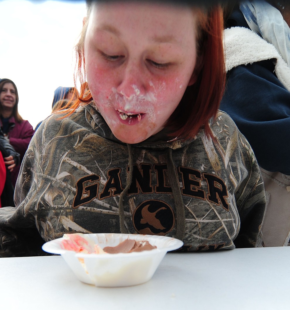It can get cold during the ice cream eating contest during the 11th Annual Polar Bear Plunge at Mountain Valley Splash in Prescott Valley Saturday, January 7. (Les Stukenberg/The Daily Courier)