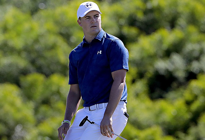 Jordan Spieth reacts to a missed birdie putt on the 17th green during the final round of the Tournament of Champions golf event, Sunday, Jan. 8, 2017, at Kapalua Plantation Course in Kapalua, Hawaii. (AP Photo/Matt York) 