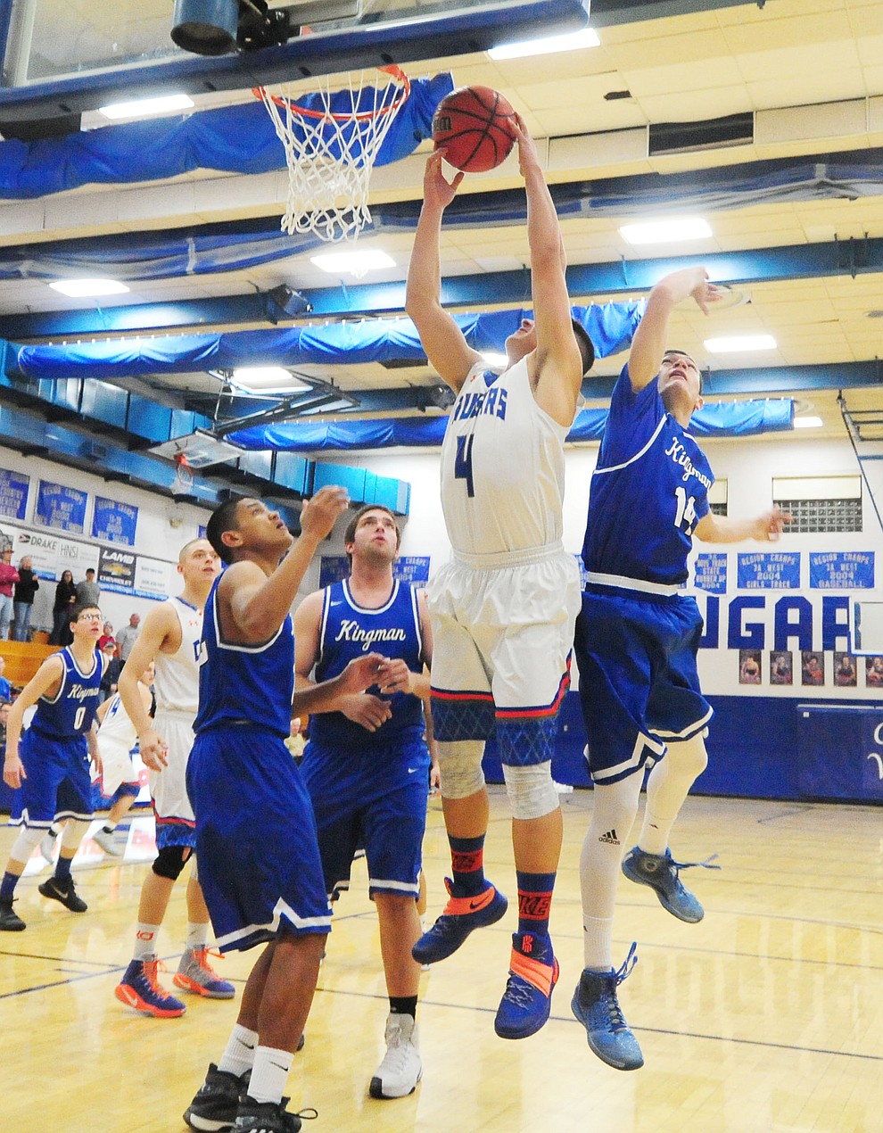 Chino Valley's Jaydon Loftin goes hard to the hoop as the Cougars take on the Kingman Bulldogs Tuesday, January 10 in Chino Vallley. (Les Stukenberg/The Daily Courier)