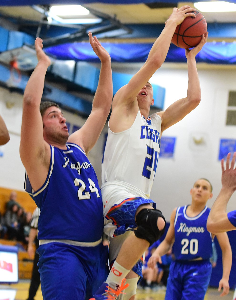 Chino Valley's Brian Sutton goes into the lane hard as the Cougars take on the Kingman Bulldogs Tuesday, January 10 in Chino Vallley. (Les Stukenberg/The Daily Courier)