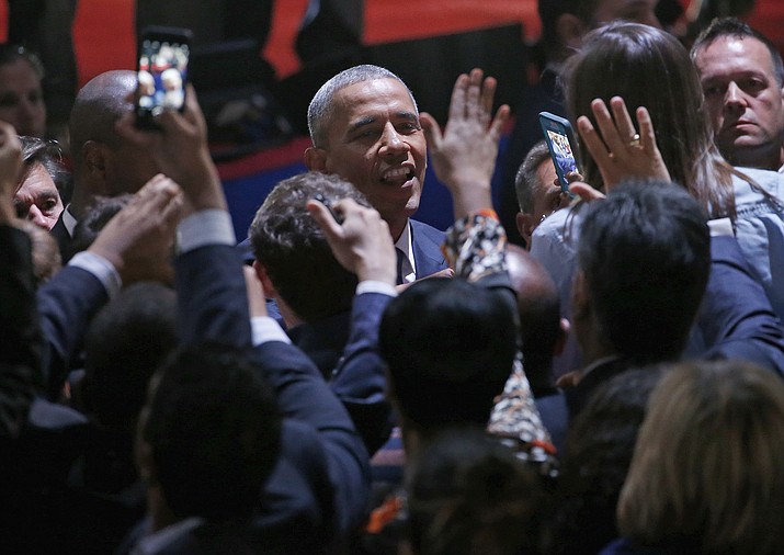President Barack Obama talks to his supporters after giving his presidential farewell address at McCormick Place in Chicago, Tuesday, Jan. 10, 2017. 