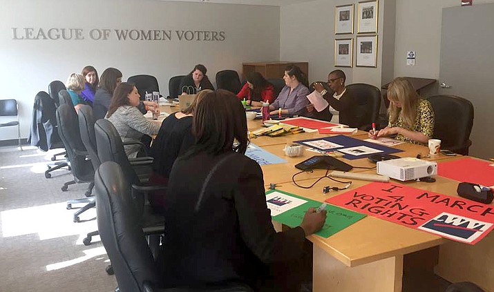 Members of the League of Women Voters U.S. gather Jan. 12 in Washington, D.C., to create signs to carry in the Women's March on Washington on Jan. 21.