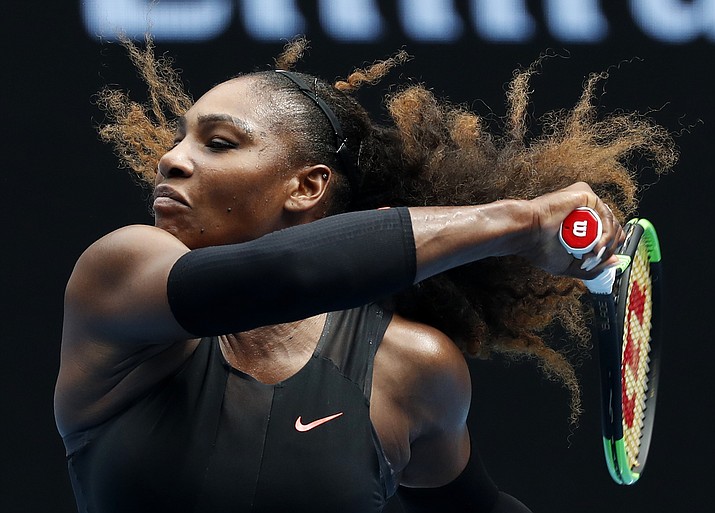 United States’ Serena Williams makes a forehand return to Barbora Strycova of the Czech Republic during their fourth round match at the Australian Open tennis championships in Melbourne, Australia, Monday, Jan. 23, 2017.
