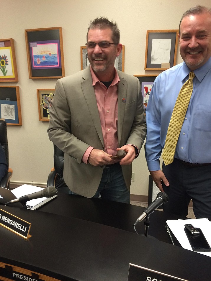 Greg Mengarelli, left, takes over the leadership of the Prescott Unified School District at Jan. 10 meeting.  At right is his predecessor, Dr. Scott Hicks.