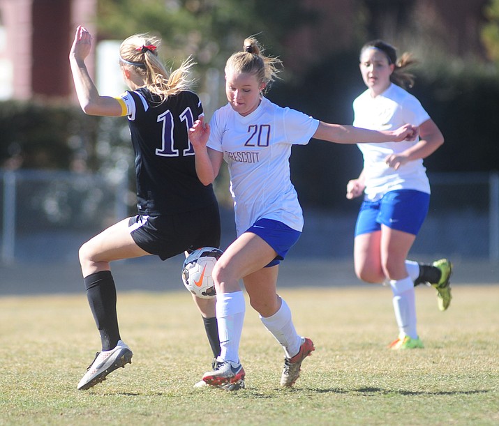 Prescott's Mikayla Sell moves the ball upfield as the Lady Badgers play Sunrise Mountain in the second round of the AIA State Soccer Tournament Saturday, February 4 in Prescott. (Les Stukenberg/The Daily Courier)