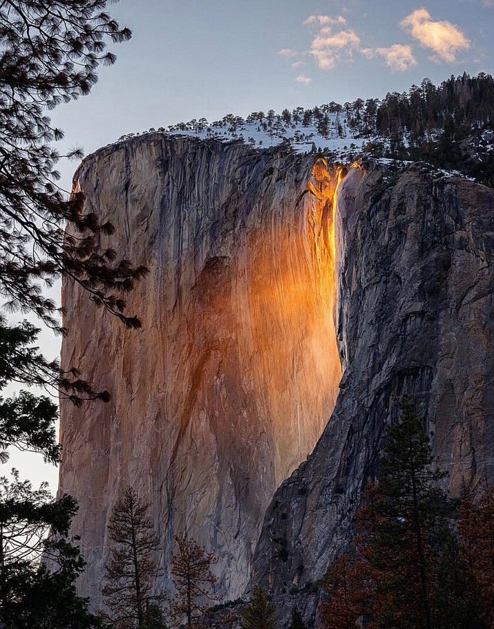 A shaft of sunlight creates a glow near Horsetail Fall, in Yosemite National Park, Calif. Mother Nature is again putting on a show at California’s Yosemite National Park, where every February the setting sun draws a narrow sliver on a waterfall to make it glow like a cascade of molten lava. The phenomenon known as “firefall” draws scores of photographers to the spot, which flows down the granite face of the park’s famed rock formation, El Capitan.