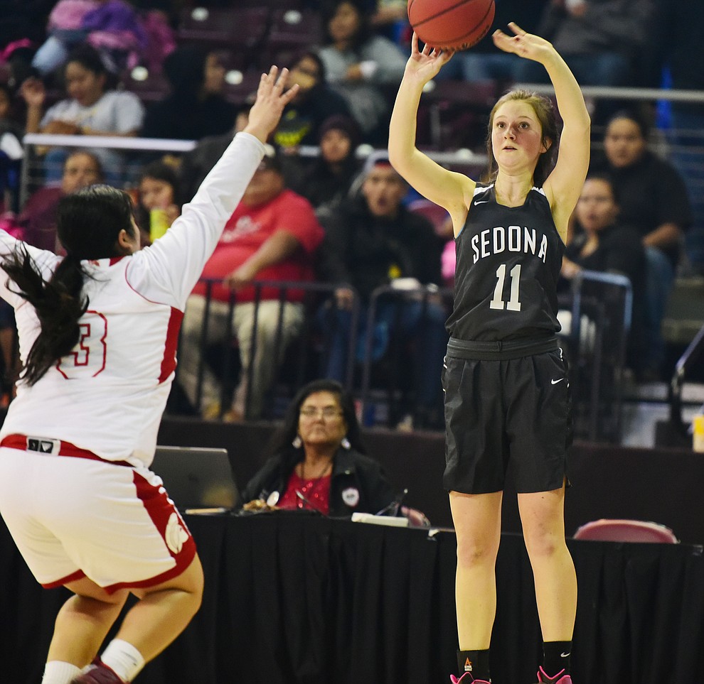 Sedona's Chenoa Crans shoots a 3-pointer as the Lady Scorpions take on the Leading Edge Academy Lady Spartans in the AIA Division 2 State Semifinals Friday, February 24 at the Prescott Valley Event Center. (Les Stukenberg/The Daily Courier)