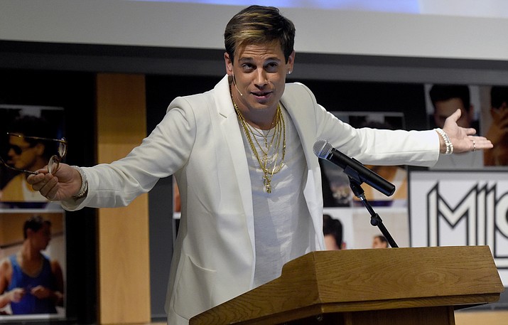 In this Jan. 25, 2017, file photo, Milo Yiannopoulos speaks on campus in the Mathematics building at the University of Colorado in Boulder, Colo. 