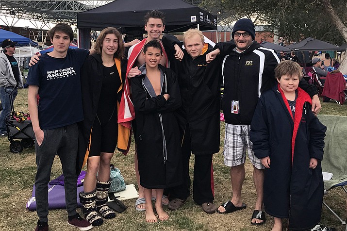 Prescott Swim Team swimmers, from left, Johnny Dyer, Renee Baillie, Josh Baillie, Jayden Long, John Kaine, Coach Matt Krieger and Jackson Warra.
