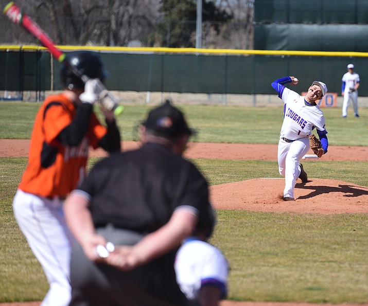 Chino Valley's Skylar Brooks delivers a pitch as the Cougars face off against Williams at their home opener in Chino Valley Friday, March 3.  (Les Stukenberg/The Daily Courier)