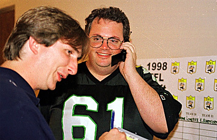 Chris Reidy (left) and Ken Sain at their 1998 fantasy football league draft in Boston.
