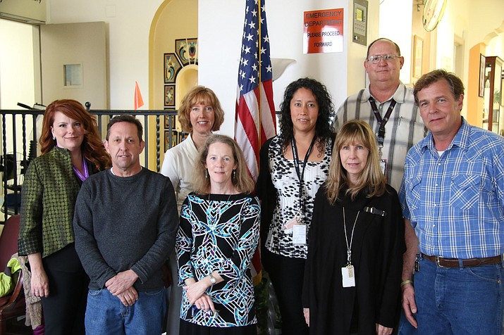 From left are Melonie Blair-Fabian, Bret Betty, Ali Cassidy, Ruby Rideout, Michele Keck, Judy Carroll, Dan Capps, Chris Glade. Blair-Fabian, Cassidy, Rideout, Keck, Carroll and Capps are Licensed Clinical Social Workers (LCSW); Betty is a Medical Support Assistant (MSA); and Glade is a Licensed Social Worker (LSW).