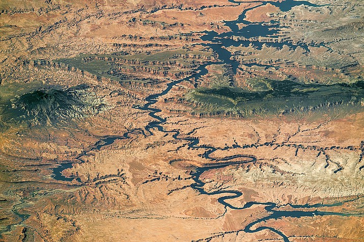 The Colorado River’s Lake Powell from the north, taken by the International Space Station. A recent report claims climate change has played a larger role in declining river flows than previously thought. Photo/NASA, Creative Commons