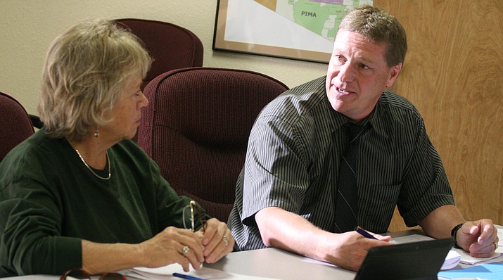 Bob Weir, right, superintendent of Valley Academy of Career and Technical Education, says auditor Heinfeld, Meech and Company, Ltd. “came highly recommended by several districts. They are very thorough and offer a lot of support and [they] help the district go in the right direction.” (Photo by Bill Helm)