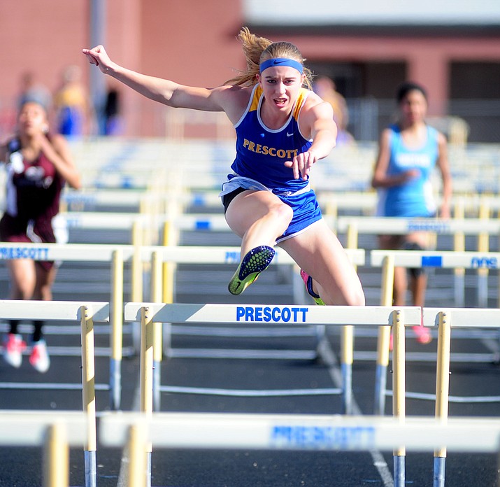 Prescott’s Makennah Mills runs a 17.18 in the 100 hurdles during a meet at Prescott High School Wednesday, March 29 in Prescott. (Les Stukenberg/Courier)