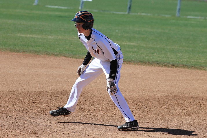 Payce Mortensen looks to run to second during a game with Mayer.