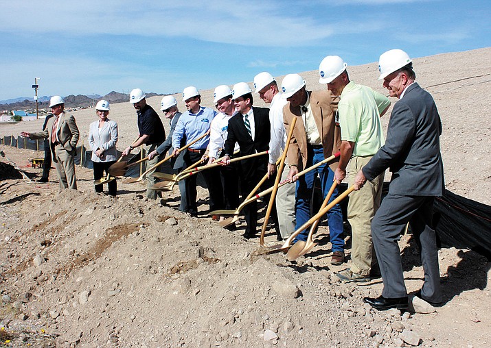 Arizona Governor Doug Ducey (center in black suit) with local city and county leaders at the Dot Foods groundbreaking ceremony in Bullhead City Wednesday.
