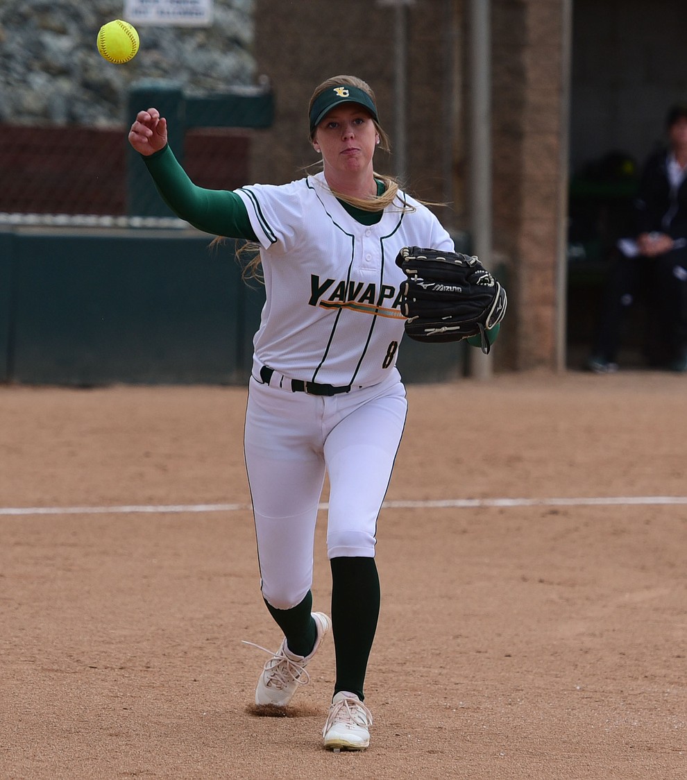 Yavapai's Amy Robinson throws to first for the out as the Lady Roughriders play Central Arizona in softball Saturday, April 8 in Prescott.  (Les Stukenberg/Courier)