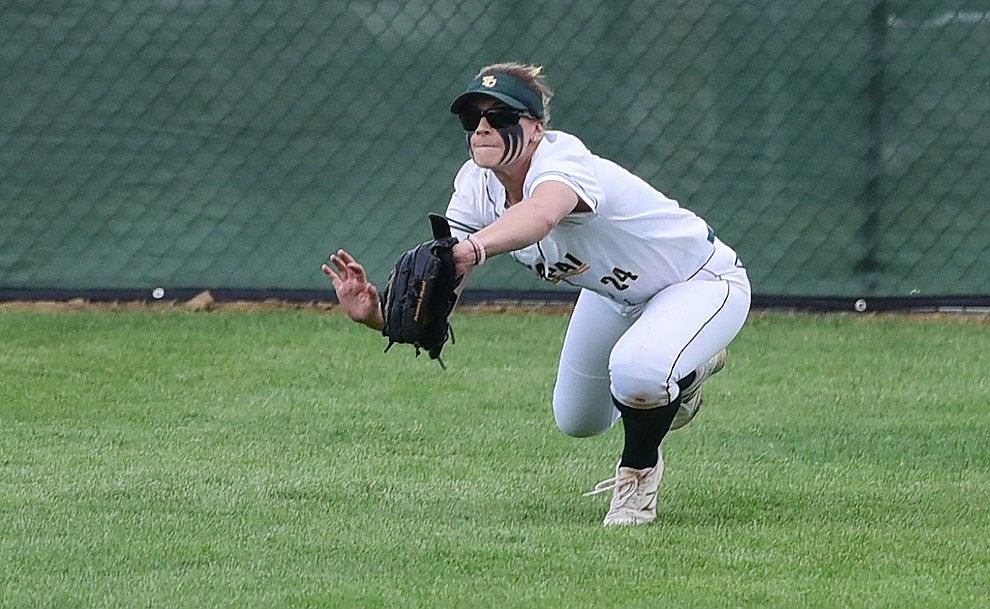 Yavapai's Mikayla Newham makes a diving catch in center field as the Lady Roughriders play Central Arizona in softball Saturday, April 8 in Prescott.  (Les Stukenberg/Courier)
