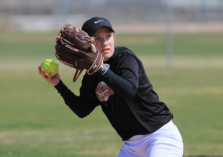 Lady Vike Maddie Jensen throws the ball from second base to home during the April 4 game with Joseph City