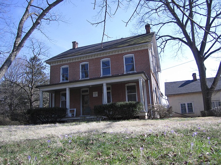 This undated photo shows a 1903 farm house in Lancaster, Penn. Dwain Livengood knows he can save money on his home renovation project by doing the work himself, but the owner of this 100-year-old farmhouse also realizes that DIY projects in historic homes require more planning and information than those in newer homes and that mistakes can be costly. (Dwain Livengood via AP)